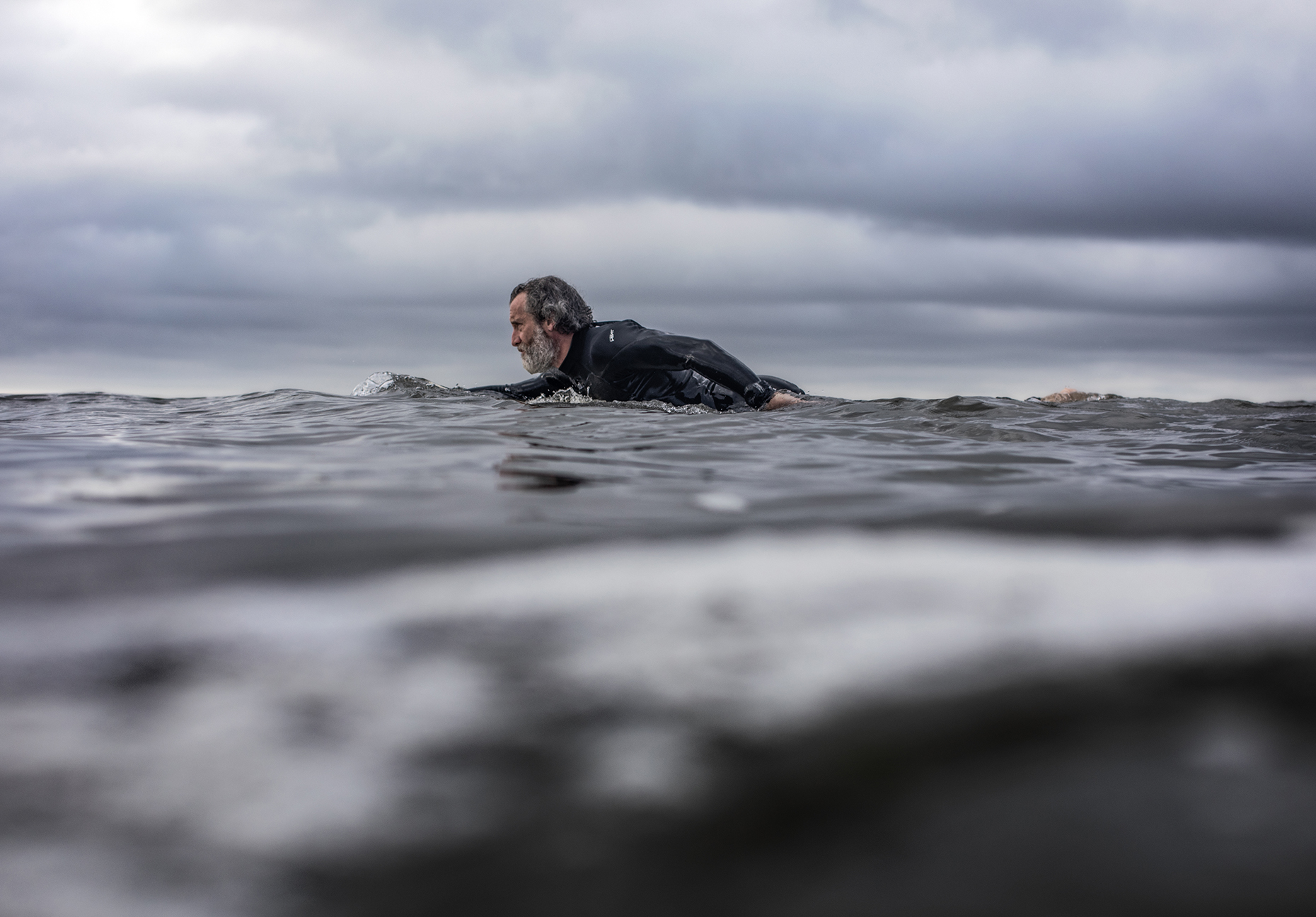 surf swimmer Orca Boston | Daniel G Weiss